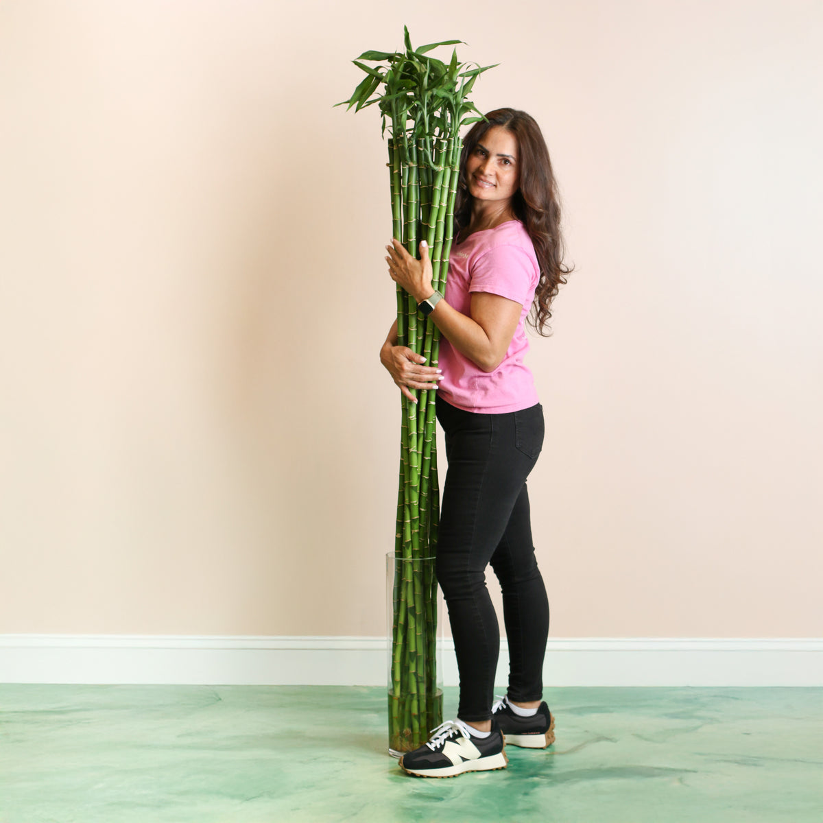 3XL Lucky Bamboo Stalks next to 5' 2" Model.